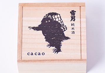 小町通りの石畳「雪男」／cacao