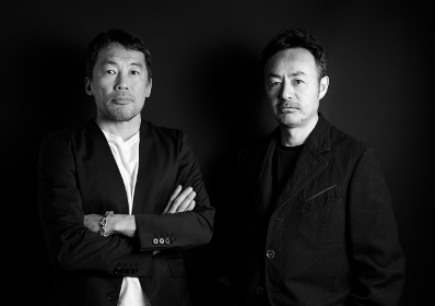 イー・エム・ボックス有限会社 代表取締役の仲谷英二郎氏(左)と飛田眞義氏(右)
